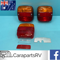 2 X NARVA REAR STOP / TAIL AND INDICATOR LAMPS PLUS SPARE LENS. CARAVAN / TRAILER